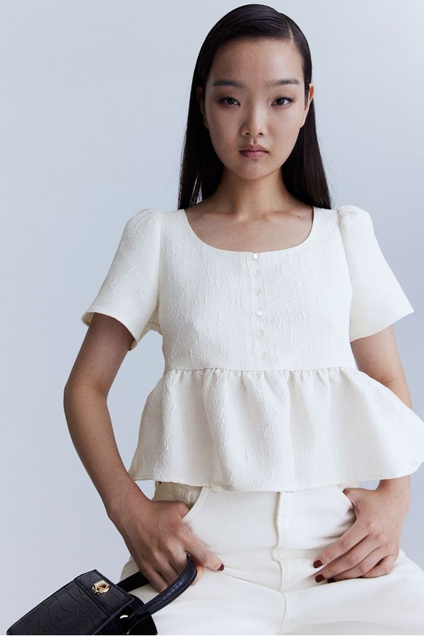 Blusa brocada con peplum