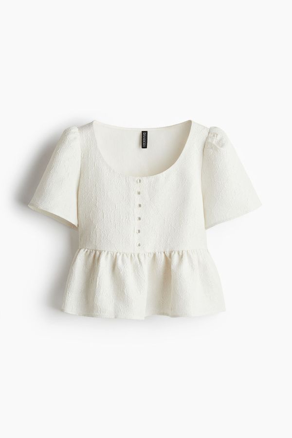 Blusa brocada con peplum
