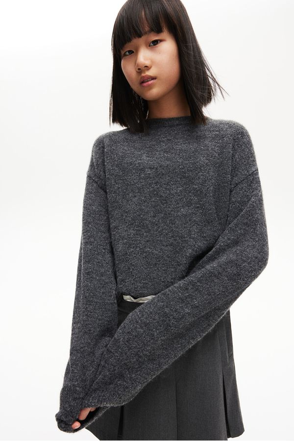 Sweater de calce holgado