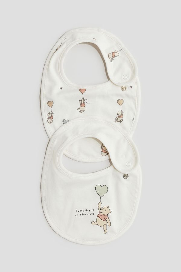 Pack de 2 baberos estampados en punto de algodón