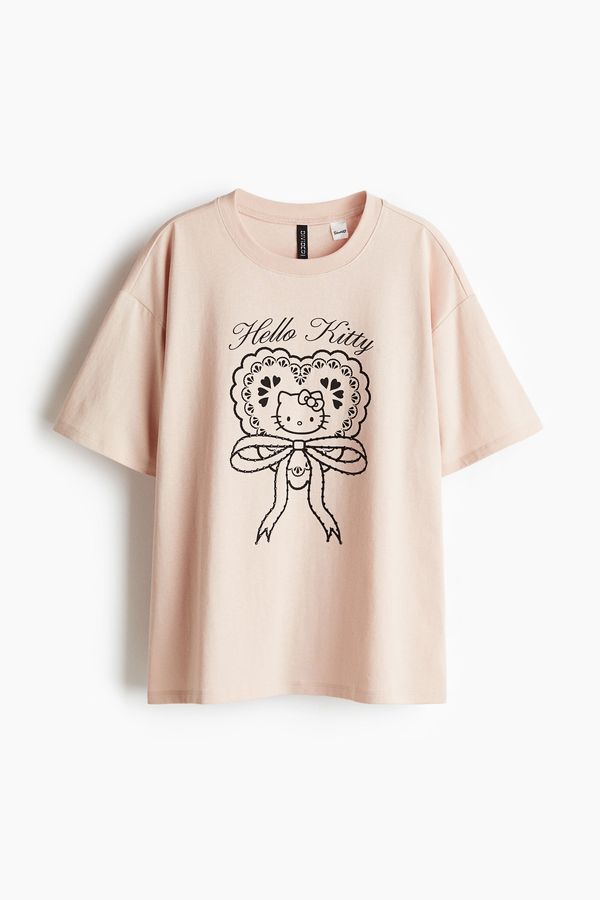 Polera oversize con motivo estampado