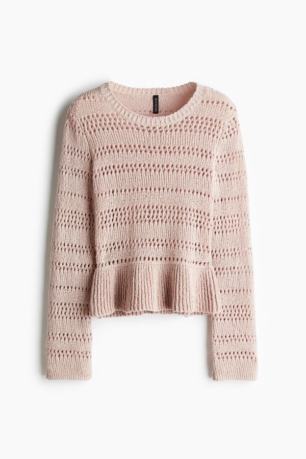 Sweater en punto pointelle con peplum
