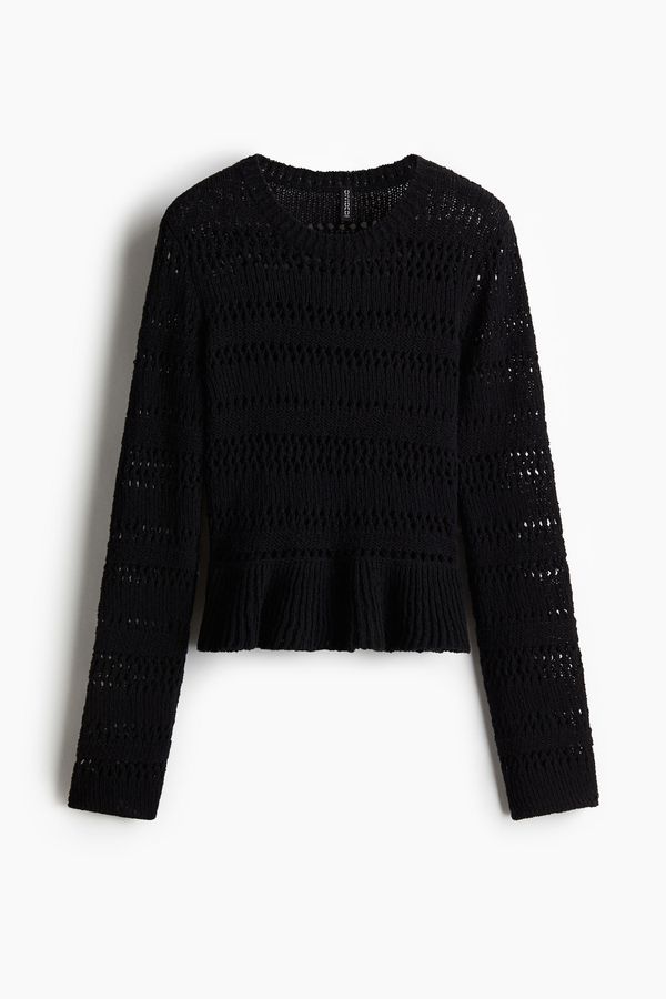Sweater en punto pointelle con peplum