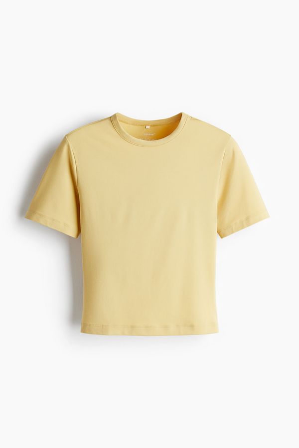 Polera deportiva cropped con DryMove™