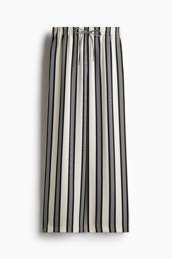 Pantalón ancho con cordón de ajuste