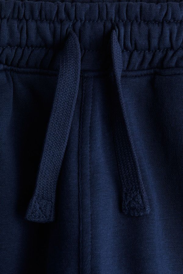 Shorts en tela de buzo