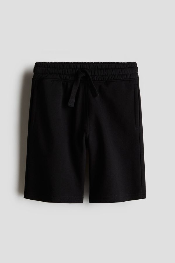 Shorts en tela de buzo
