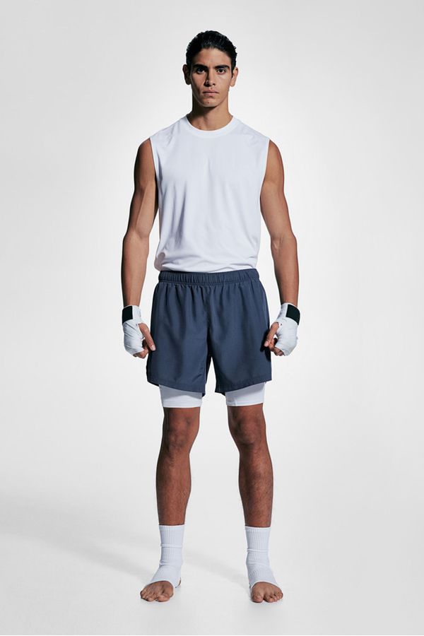 Shorts deportivo de doble capa con DryMove™