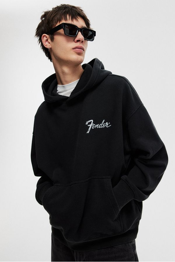 Polerón hoodie Oversized Fit con motivo