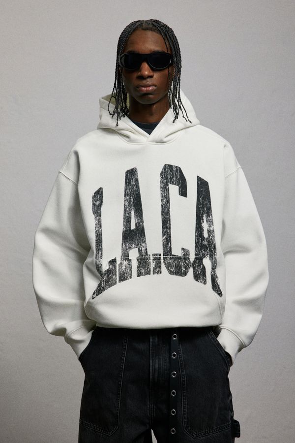 Polerón hoodie con estampado Loose Fit