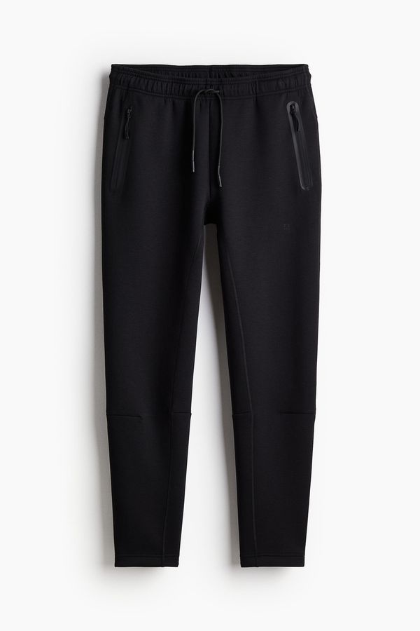 Joggers deportivos con DryMove™ Slim Fit