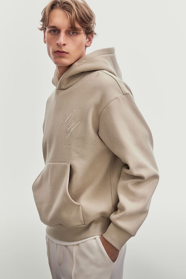 Polerón hoodie estampado Loose Fit