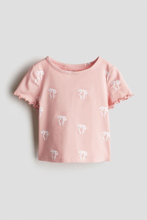 Polera de algodón con detalles sobrehilados