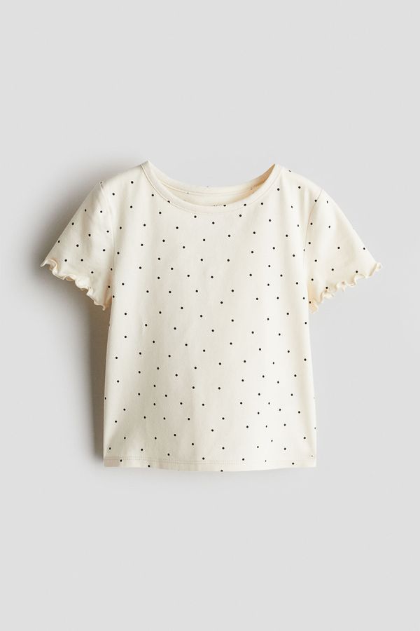 Polera de algodón con detalles sobrehilados