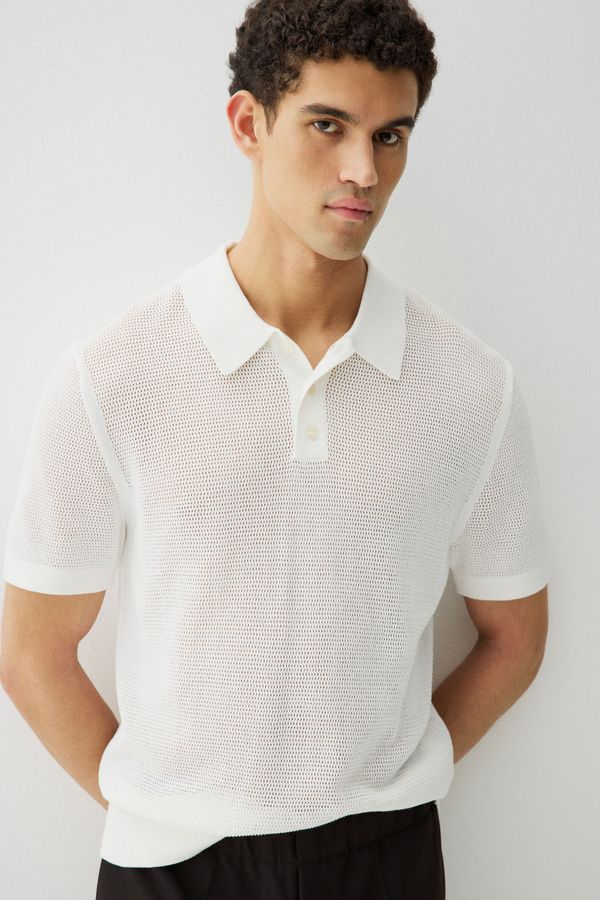 Polera polo en punto calado Regular Fit
