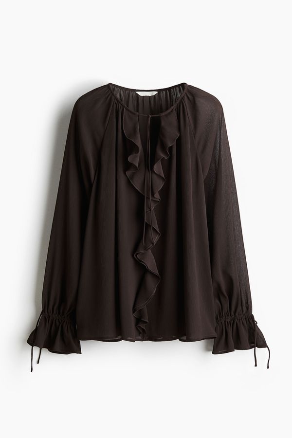 Blusa con ribetes de vuelos