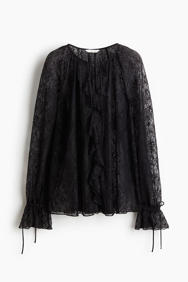 Blusa de encaje con ribetes de vuelos