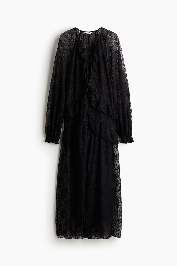 Vestido de encaje con ribetes de vuelos