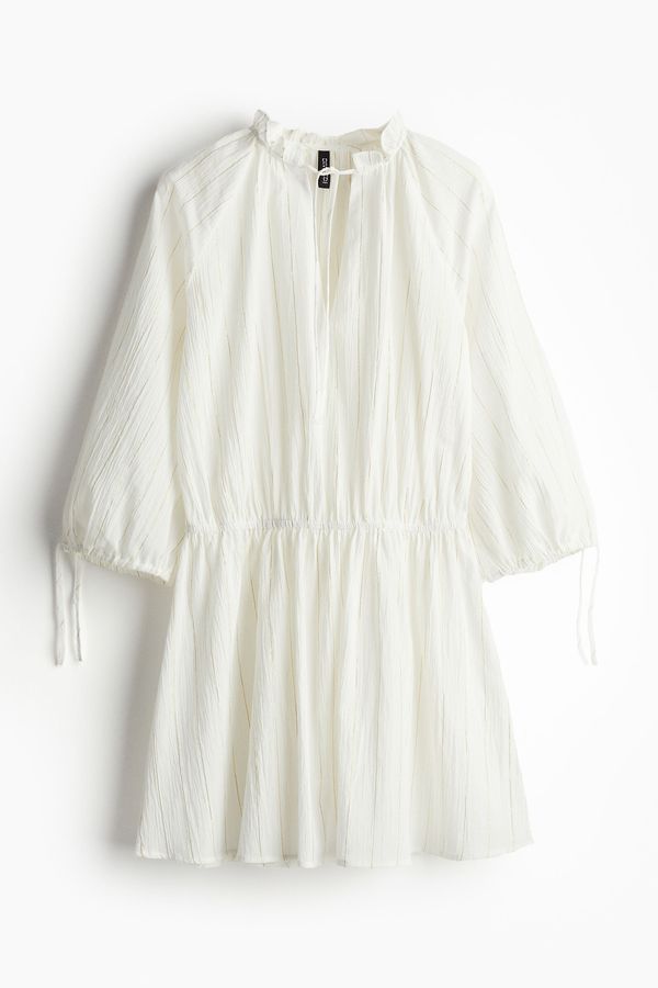 Vestido túnica con brillo y detalle de nudo