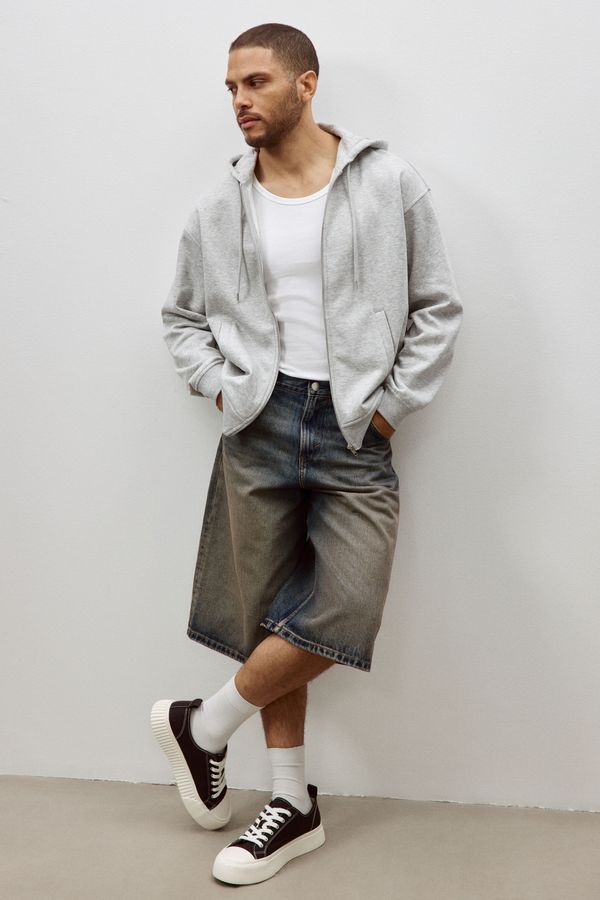 Polerón hoodie con cierre Loose Fit