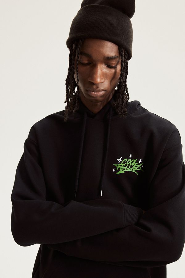 Polerón hoodie estampado Loose Fit