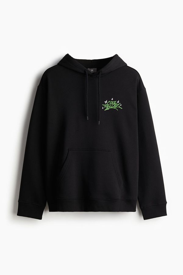 Polerón hoodie estampado Loose Fit