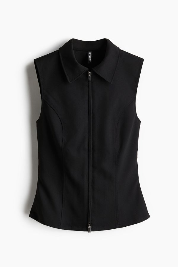 Top sin mangas con cuello camisero y cierre