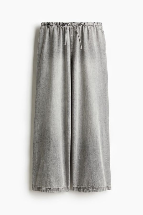 Pantalón denim con cordón de ajuste