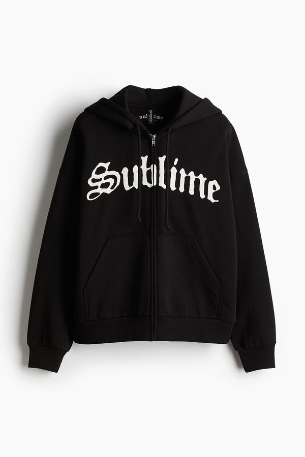Polerón hoodie oversize con cierre y motivo