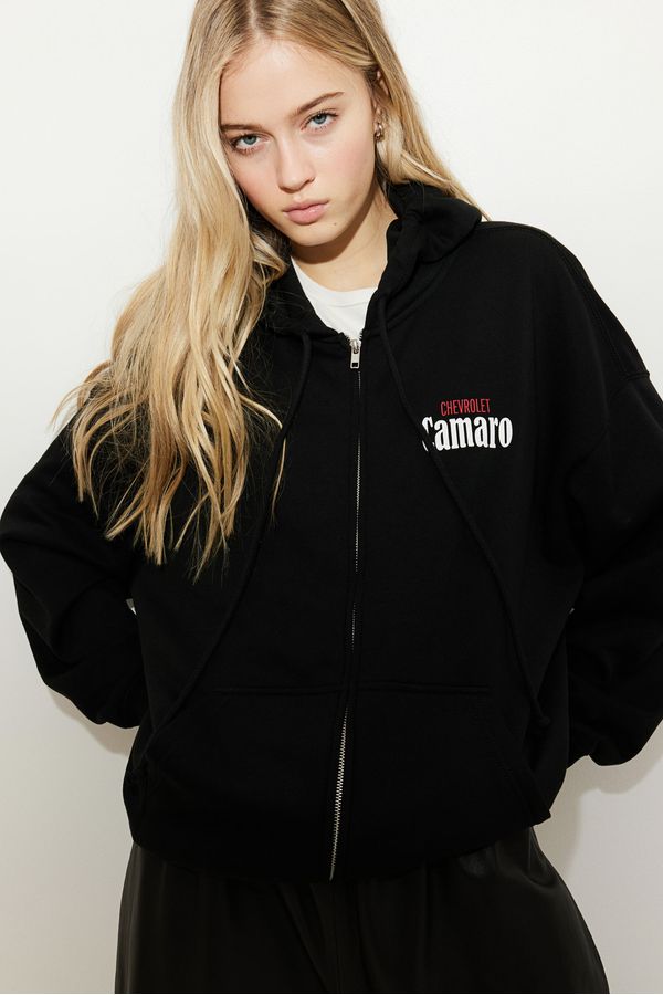 Polerón hoodie oversize con motivo estampado