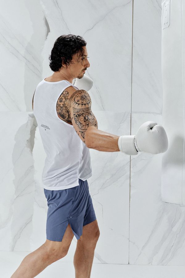 Shorts deportivo a media pierna con DryMove™