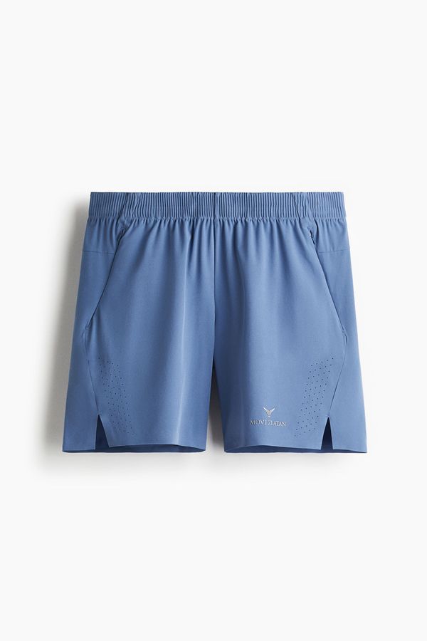 Shorts deportivo a media pierna con DryMove™