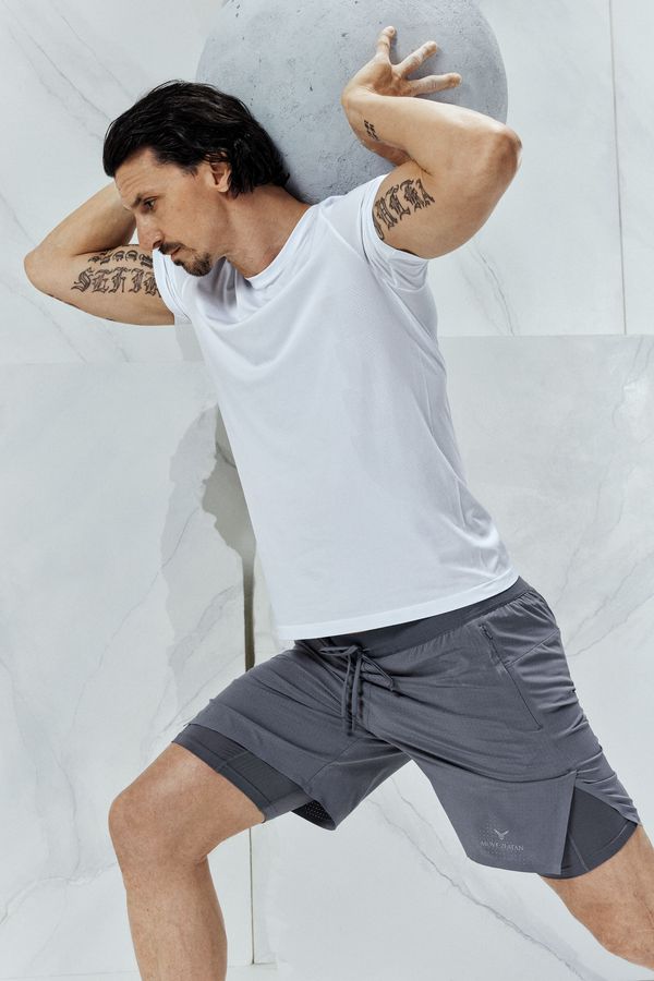 Shorts deportivo de doble capa con DryMove™
