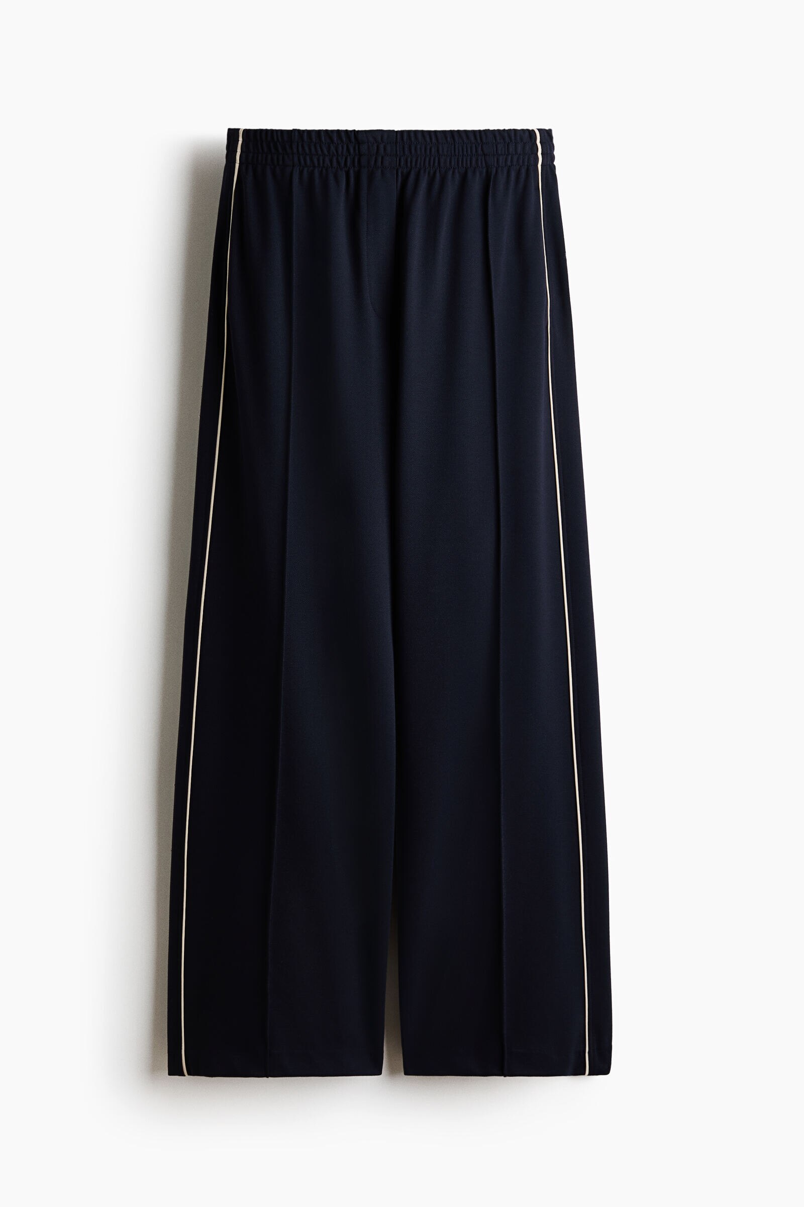 Pantalón amplio con raya