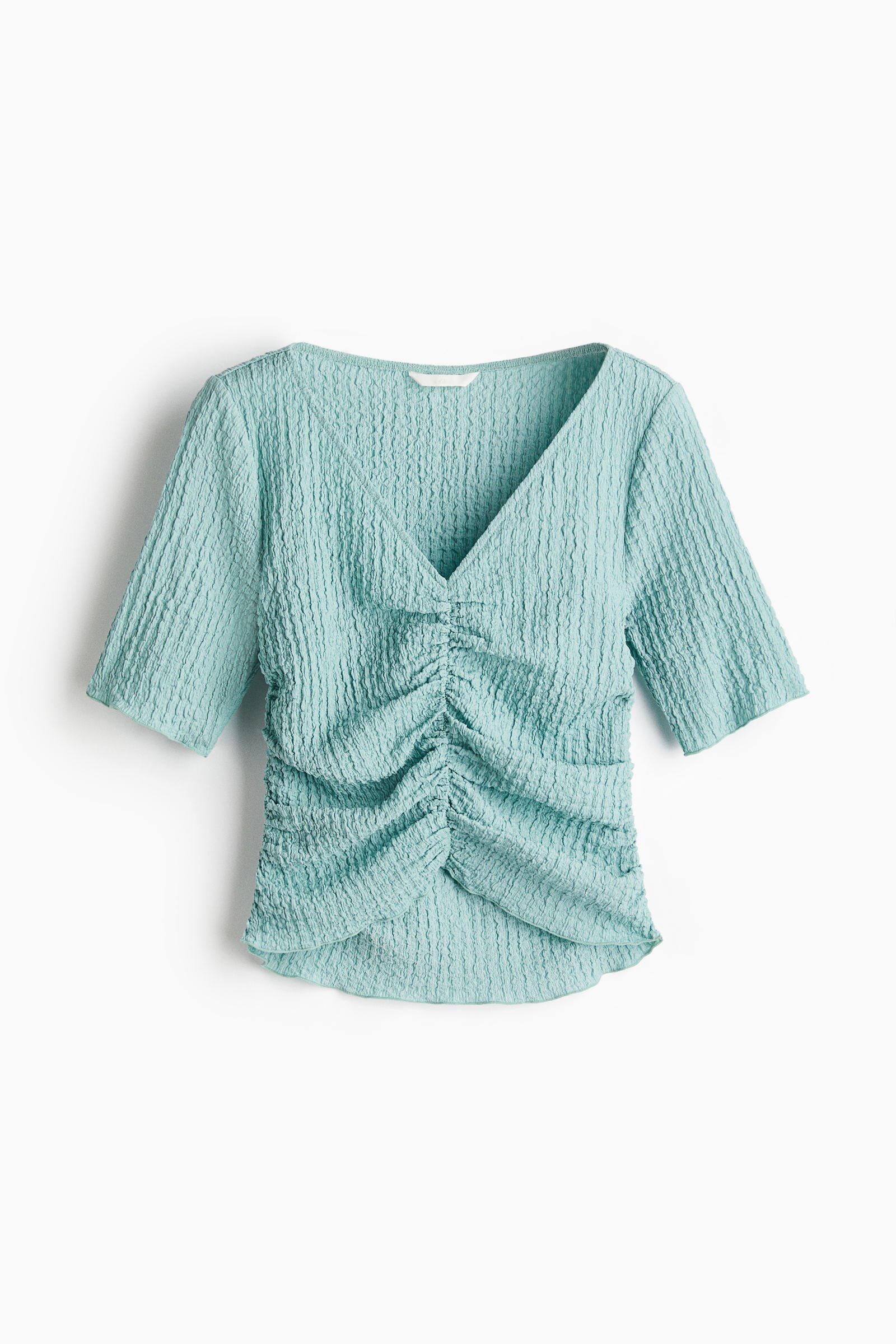 Top drapeado con textura